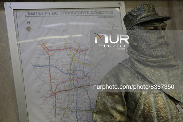 José Miguel Moctezuma, characterised as Don Ferro Ferrocarrilero, during a performance as a living statue inside the Bellas Artes metro stat...