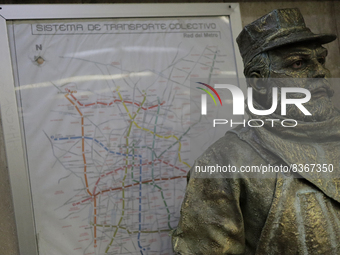 José Miguel Moctezuma, characterised as Don Ferro Ferrocarrilero, during a performance as a living statue inside the Bellas Artes metro stat...