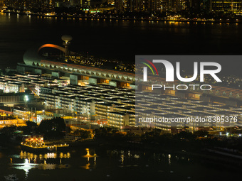 Hong Kong, China, 9 Jun 2022, The Kai Tak Cruise Terminal and the Kai Tak Community Isolation Facility for Covid patients are seen at night....