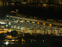 Hong Kong, China, 9 Jun 2022, The Kai Tak Cruise Terminal and the Kai Tak Community Isolation Facility for Covid patients are seen at night....