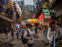 Hong Kong, China, 11 Jun 2022, People crowd the streets in Mongkok, despite a rise in the numbers of Covid contaminations. (