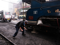 The steam engines of UNESCO World Heritage Site Darjeeling Himalayan Railway ''toy train''-s at the Darjeeling loco shed preparing for the e...