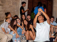 Fifth-year high school students met under their schools to sing Antonello Venditti's historic song, 'Notte Prima degli Esami', in Rieti, Ita...