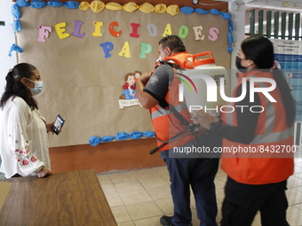 Civil Protection workers spread disinfectant inside class rooms of a primary school  to avoid new Covid-19 infections after an increase of C...