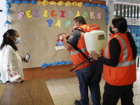 Civil Protection workers spread disinfectant inside class rooms of a primary school  to avoid new Covid-19 infections after an increase of C...