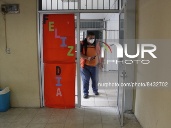 Civil Protection workers spread disinfectant inside class rooms of a primary school  to avoid new Covid-19 infections after an increase of C...