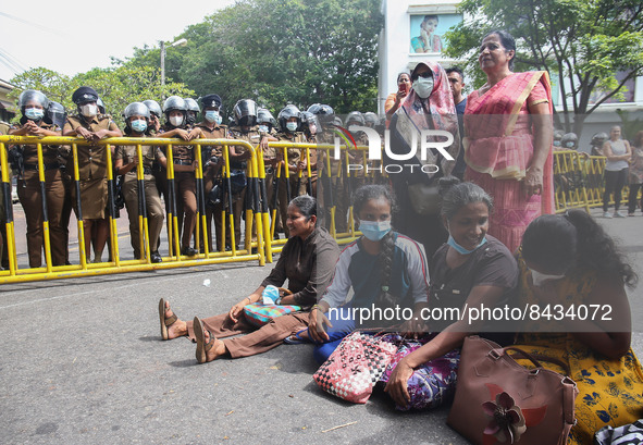 Members of the Samagi Vanitha Balawegaya, protest near Sri Lanka's Prime Minister Ranil Wickremesinghe's private residence, amid the country...