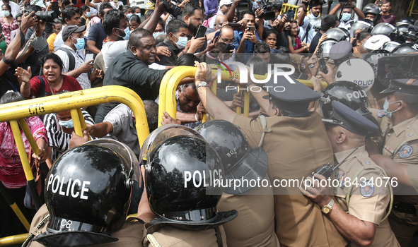 Members of the Samagi Vanitha Balawegaya, protest near Sri Lanka's Prime Minister Ranil Wickremesinghe's private residence, amid the country...