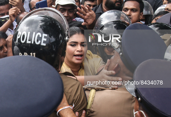 Hirunika Premachandra, the member of the Samagi Jana Balawegaya and leader of Samagi Vanitha Balawegaya, during a protest near Sri Lanka's P...