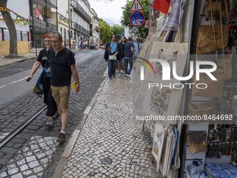 People are seen walking down one of the streets in the Graça neighborhood. Lisbon, June 24, 2022. In Portugal, covid-19 mortality is declini...