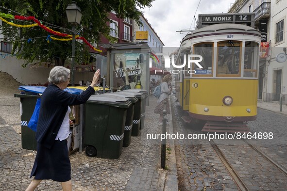 A tram runs through the different routes of the Graca neighborhood. Lisbon, June 24, 2022. In Portugal, covid-19 mortality is declining, alt...