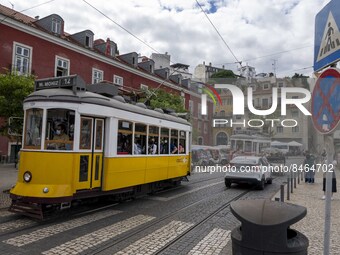 A tram runs through the different routes of the Graca neighborhood. Lisbon, June 24, 2022. In Portugal, covid-19 mortality is declining, alt...