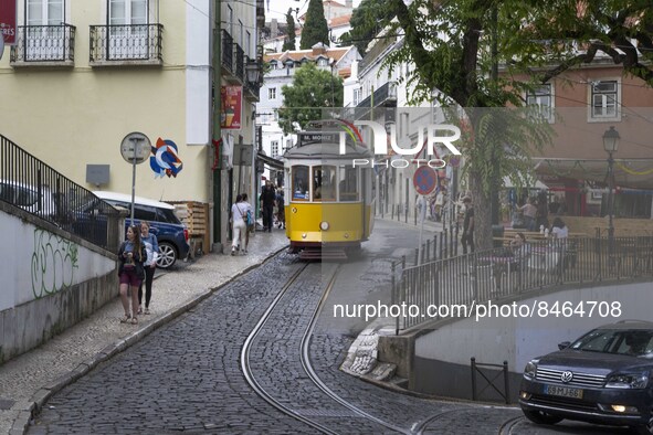 A tram runs through the different routes of the Graca neighborhood. Lisbon, June 24, 2022. In Portugal, covid-19 mortality is declining, alt...