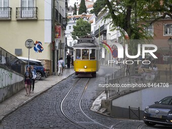 A tram runs through the different routes of the Graca neighborhood. Lisbon, June 24, 2022. In Portugal, covid-19 mortality is declining, alt...