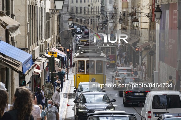 Vehicles and trams are seen driving through the streets of the Baxia district. Lisbon, June 24, 2022. In Portugal, covid-19 mortality is dec...