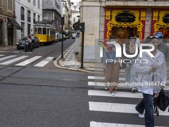 People are seen walking in the streets of the Baixa district. Lisbon, June 24, 2022. In Portugal, covid-19 mortality is declining, although...