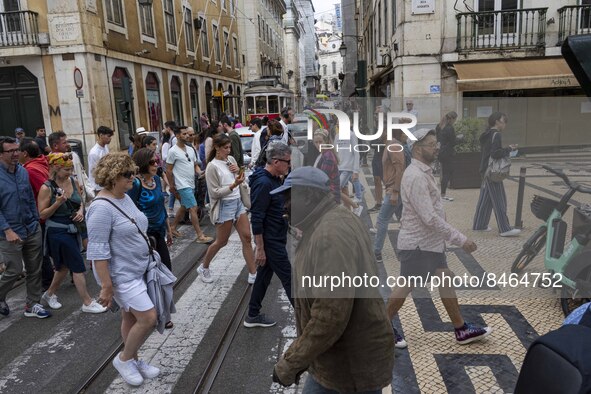 People are seen walking in the streets of the Baixa district. Lisbon, June 24, 2022. In Portugal, covid-19 mortality is declining, although...