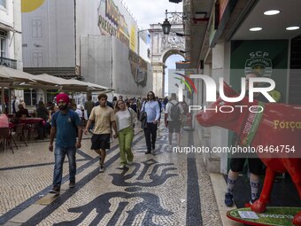 People are seen walking in the streets of the Baixa district. Lisbon, June 24, 2022. In Portugal, covid-19 mortality is declining, although...