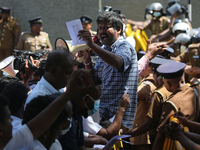 Sri Lankan health workers shout slogans in protest amid the country’s economic crisis in Colombo, Sri Lanka, June 29, 2022.(