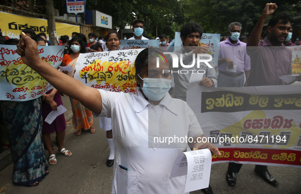 Sri Lankan health workers shout slogans in protest amid the country’s economic crisis in Colombo, Sri Lanka, June 29, 2022.