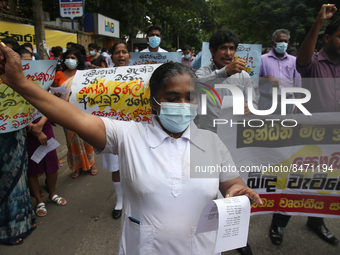 Sri Lankan health workers shout slogans in protest amid the country’s economic crisis in Colombo, Sri Lanka, June 29, 2022.(