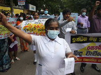 Sri Lankan health workers shout slogans in protest amid the country’s economic crisis in Colombo, Sri Lanka, June 29, 2022.(