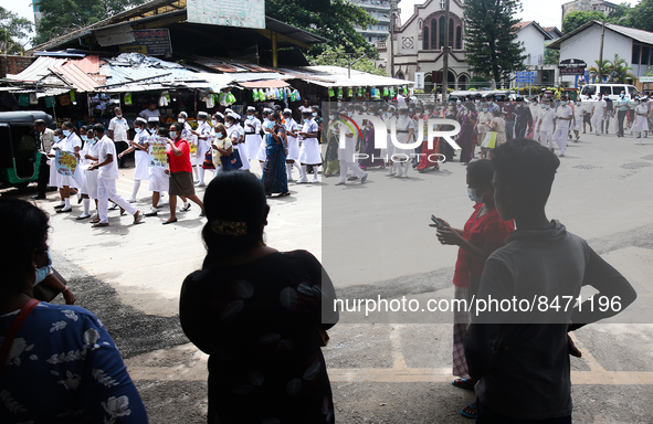 Sri Lankan health workers shout slogans in protest amid the country’s economic crisis in Colombo, Sri Lanka, June 29, 2022.