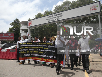 Sri Lankan health workers shout slogans in protest amid the country’s economic crisis in Colombo, Sri Lanka, June 29, 2022.(