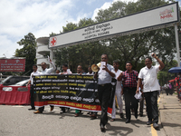 Sri Lankan health workers shout slogans in protest amid the country’s economic crisis in Colombo, Sri Lanka, June 29, 2022.(