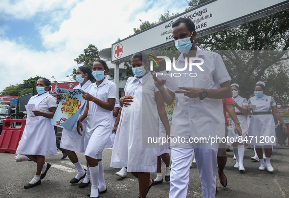 Sri Lankan health workers shout slogans in protest amid the country’s economic crisis in Colombo, Sri Lanka, June 29, 2022.