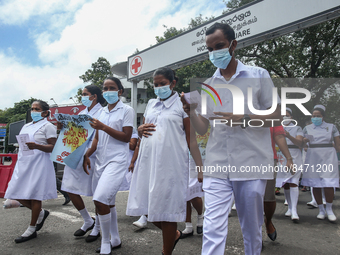 Sri Lankan health workers shout slogans in protest amid the country’s economic crisis in Colombo, Sri Lanka, June 29, 2022.(