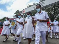 Sri Lankan health workers shout slogans in protest amid the country’s economic crisis in Colombo, Sri Lanka, June 29, 2022.(