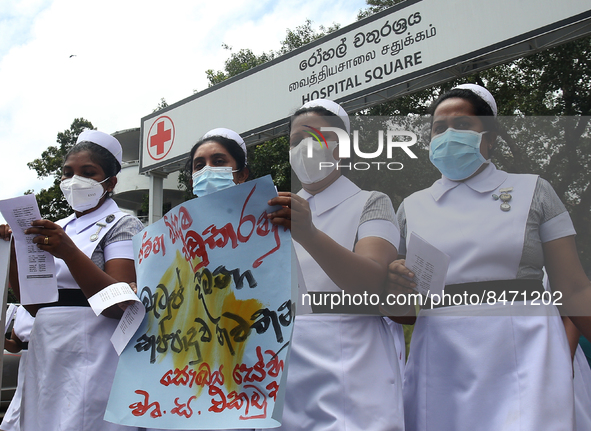 Sri Lankan health workers shout slogans in protest amid the country’s economic crisis in Colombo, Sri Lanka, June 29, 2022.