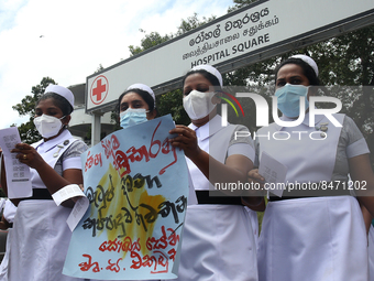 Sri Lankan health workers shout slogans in protest amid the country’s economic crisis in Colombo, Sri Lanka, June 29, 2022.(