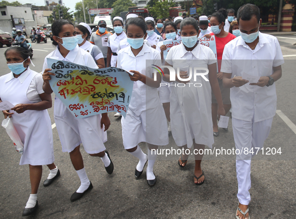 Sri Lankan health workers shout slogans in protest amid the country’s economic crisis in Colombo, Sri Lanka, June 29, 2022.