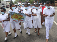 Sri Lankan health workers shout slogans in protest amid the country’s economic crisis in Colombo, Sri Lanka, June 29, 2022.(