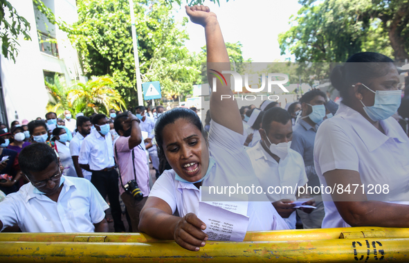 Sri Lankan health workers shout slogans in protest amid the country’s economic crisis in Colombo, Sri Lanka, June 29, 2022.