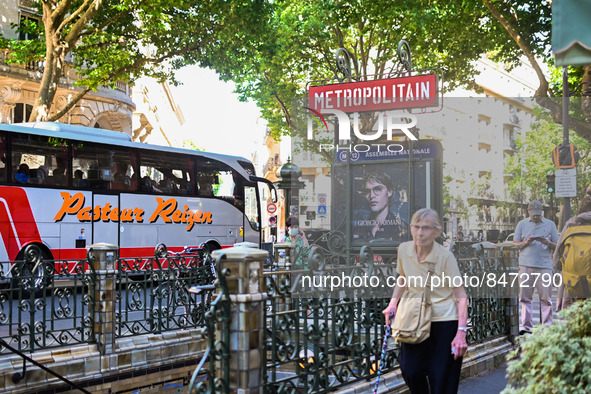 A woman about to enter the metro station. Daily life in Parisian metro, as France faces an increase of Covid19 cases. . 