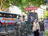 A woman about to enter the metro station. Daily life in Parisian metro, as France faces an increase of Covid19 cases. . (