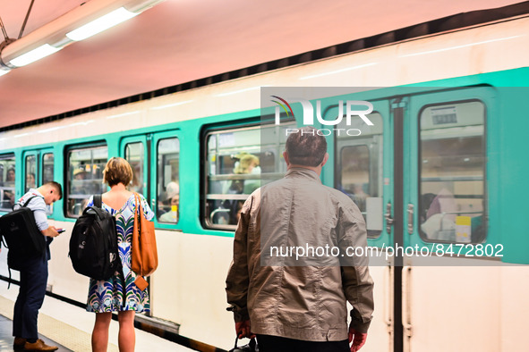 A man watches the metro incoming. Daily life in Parisian metro, as France faces an increase of Covid19 cases. . 