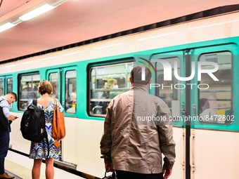 A man watches the metro incoming. Daily life in Parisian metro, as France faces an increase of Covid19 cases. . (