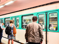 A man watches the metro incoming. Daily life in Parisian metro, as France faces an increase of Covid19 cases. . (