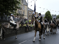 Galashiels, UK. 02 Jul.2022.  
Braw Lad John Turnbull carries the Burgh Flag on horse back , ready to lead the ceremonial rideout.

GALASHIE...