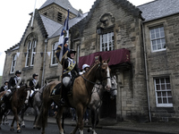 Galashiels, UK. 02 Jul.2022.  
Braw Lad John Turnbull carries the Burgh Flag on horse back , ready to lead the ceremonial rideout.

GALASHIE...