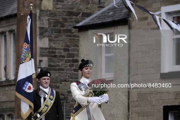 Galashiels, UK. 02 Jul.2022.  
Braw Lass Abbie Hood, at the Old Town cross where the creation of Galashiels as a Burgh of Barony in 1599 is...