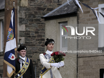 Galashiels, UK. 02 Jul.2022.  
Braw Lass Abbie Hood, at the Old Town cross where the creation of Galashiels as a Burgh of Barony in 1599 is...