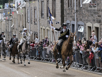 Galashiels, UK. 02 Jul.2022.  
Principals Gallop up Scott Street.
Braw Lad John Turnbull, Braw Lass Abbie Hood, Bearer of Sod, Ex-Braw Lad R...