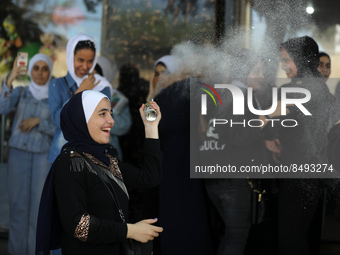 Palestinian students celebrate the last day in their final high school exams, known as ''Tawjihi'', in Gaza city on July 04, 2022.  (