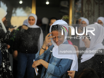 Palestinian students celebrate the last day in their final high school exams, known as ''Tawjihi'', in Gaza city on July 04, 2022.  (