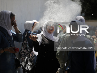 Palestinian students celebrate the last day in their final high school exams, known as ''Tawjihi'', in Gaza city on July 04, 2022.  (